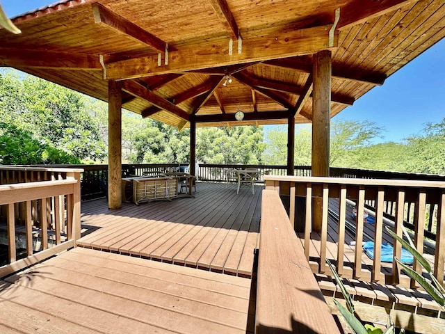 wooden terrace with a gazebo