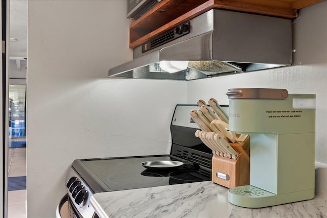 kitchen with exhaust hood