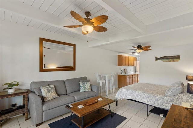 tiled bedroom featuring ceiling fan, beam ceiling, and wood ceiling