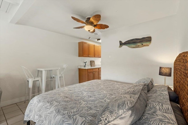 bedroom featuring light tile patterned floors and ceiling fan