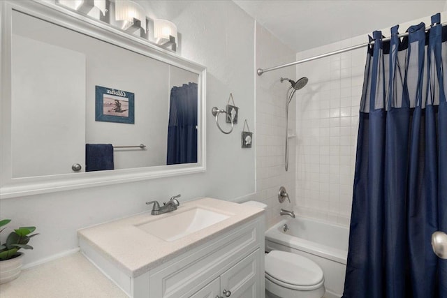 full bathroom featuring toilet, vanity, and shower / bath combo