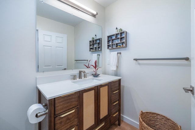 bathroom featuring hardwood / wood-style flooring and vanity