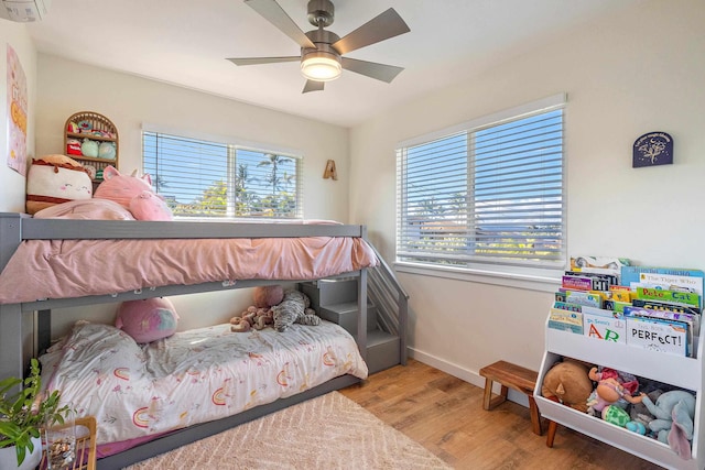 bedroom featuring ceiling fan and light wood-type flooring