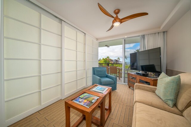 living room featuring ceiling fan