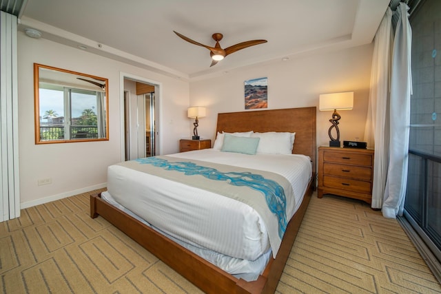 bedroom featuring light carpet and ceiling fan