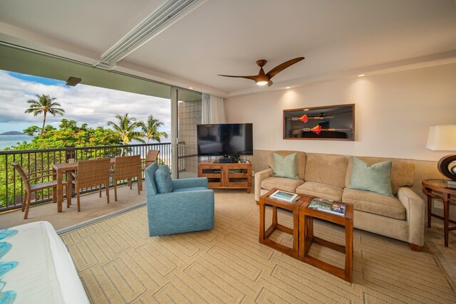 living room featuring ceiling fan