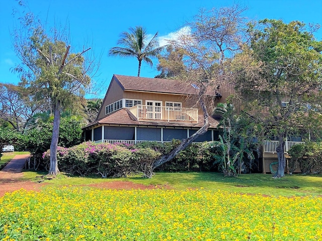 exterior space with a front yard