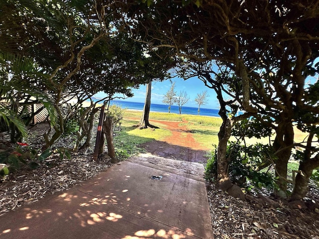 view of yard with a water view