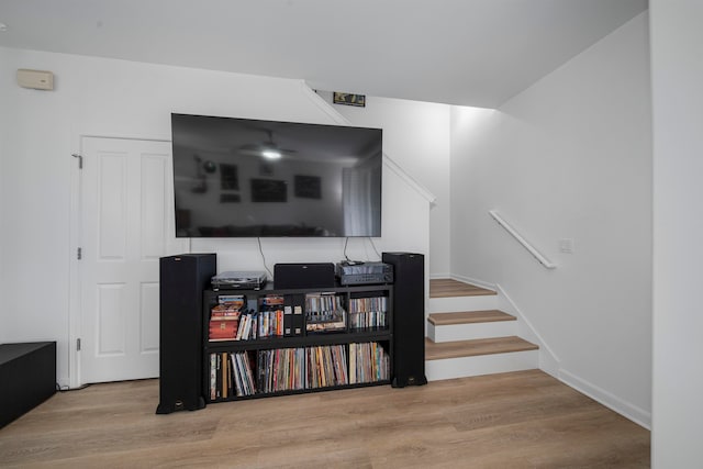 stairway featuring wood-type flooring