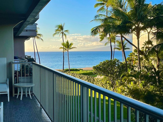 balcony featuring a water view