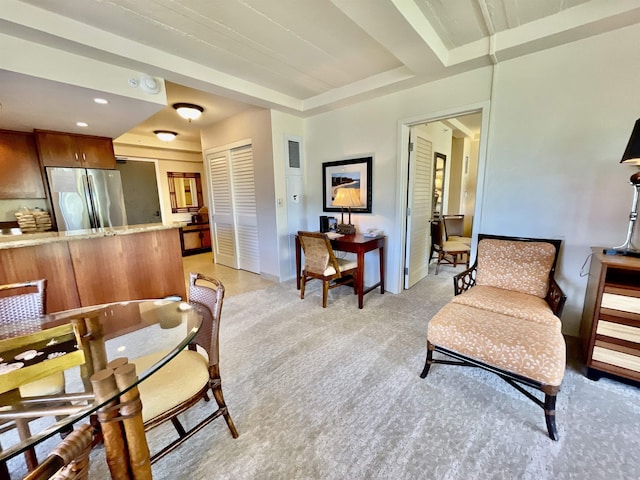 living room featuring light colored carpet