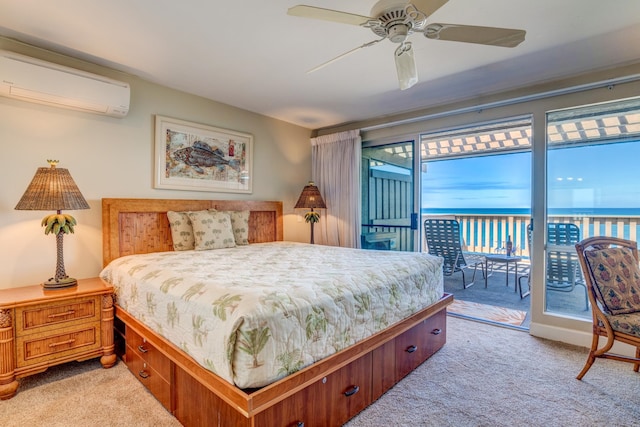 carpeted bedroom featuring access to exterior, a water view, a wall unit AC, and ceiling fan