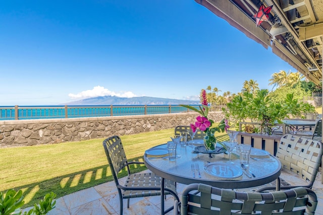 4909 Lower Honoapiilani Rd Unit A8, Lahaina, HI 96761 - view of patio featuring outdoor dining space and a mountain view