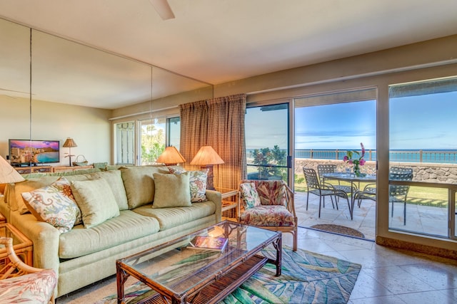 living room featuring a water view