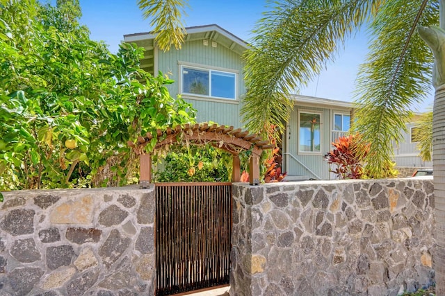 view of front of house with a gate and a fenced front yard