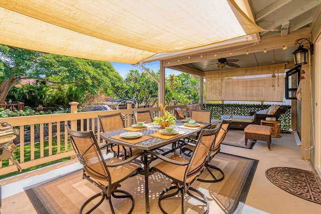 view of patio / terrace featuring outdoor dining area and a ceiling fan