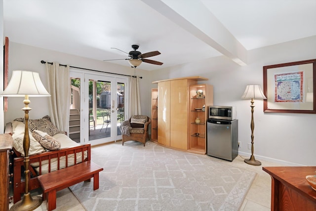 interior space with baseboards, beamed ceiling, french doors, fridge, and access to outside