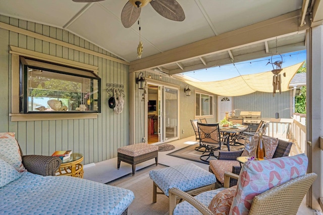 view of patio featuring outdoor dining area and ceiling fan