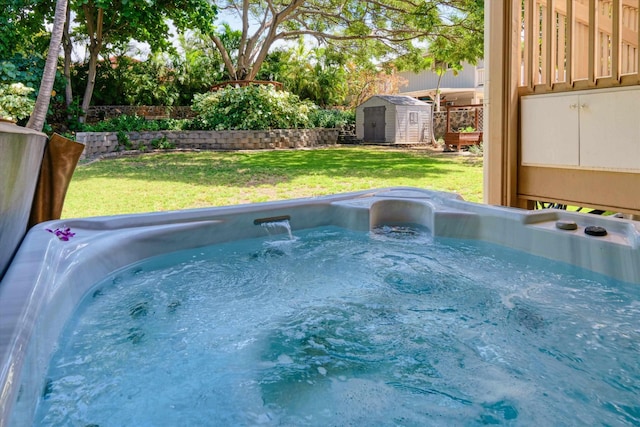 view of swimming pool with an outbuilding, a storage shed, a lawn, and a hot tub