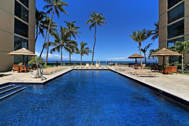 110 Kaanapali Shores Pl Unit 817, Lahaina, HI 96761 - community pool featuring a patio area and a water view