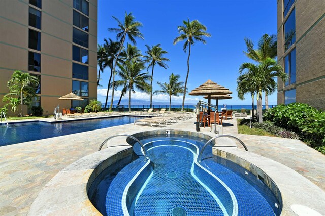 110 Kaanapali Shores Pl Unit 817, Lahaina, HI 96761 - community pool featuring a hot tub and a patio
