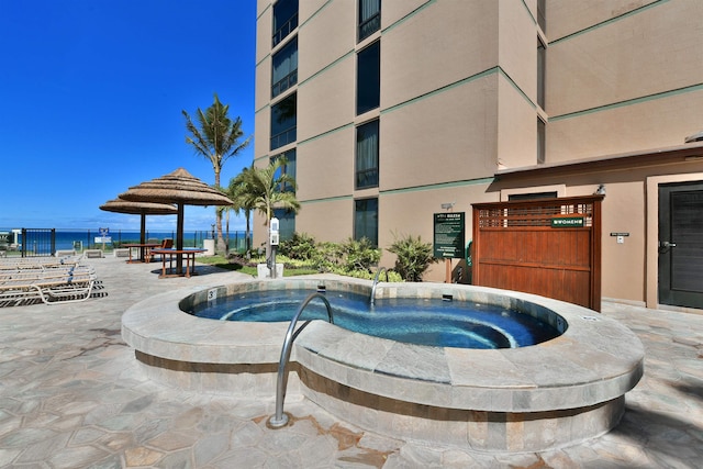 110 Kaanapali Shores Pl Unit 817, Lahaina, HI 96761 - view of swimming pool with a hot tub, a gazebo, and a water view