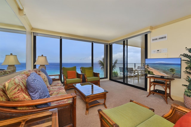 110 Kaanapali Shores Pl Unit 817, Lahaina, HI 96761 - living area with a wall of windows, carpet, and crown molding