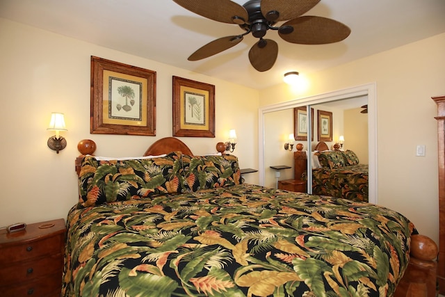 bedroom with ceiling fan and a closet