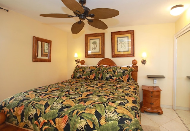 bedroom featuring ceiling fan and light tile patterned floors