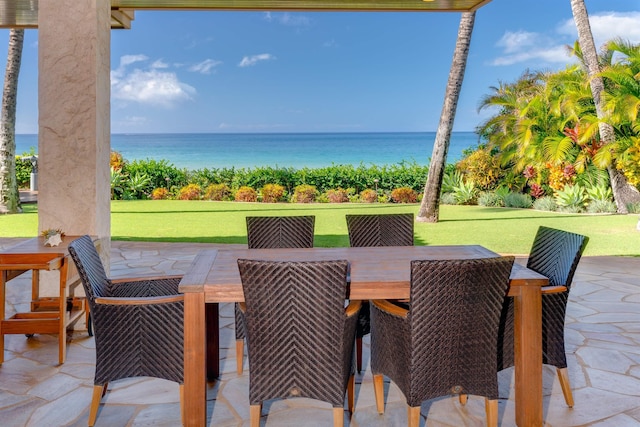 view of patio with a water view