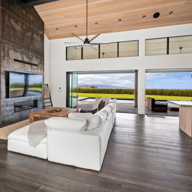 715 Laulama Pl Unit 45, Lahaina, HI 96761 - living room featuring high vaulted ceiling, a fireplace, wood finished floors, wood ceiling, and ceiling fan