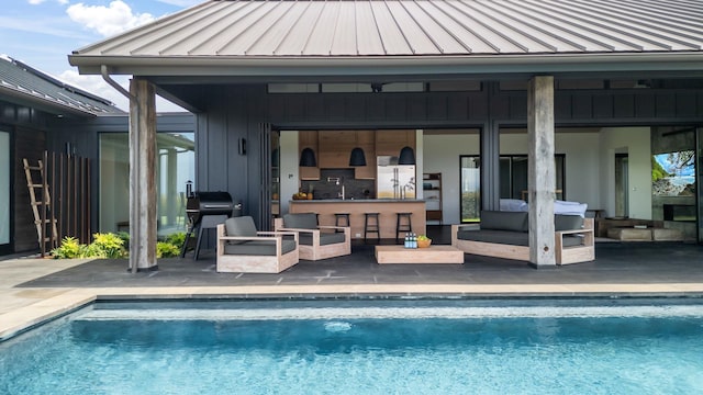 715 Laulama Pl Unit 45, Lahaina, HI 96761 - swimming pool with area for grilling, a patio, and an outdoor living space