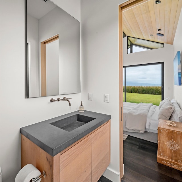 715 Laulama Pl Unit 45, Lahaina, HI 96761 - ensuite bathroom with vanity, wood finished floors, lofted ceiling, toilet, and wooden ceiling