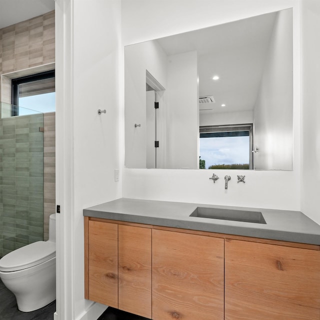 715 Laulama Pl Unit 45, Lahaina, HI 96761 - full bathroom featuring vanity, toilet, a tile shower, and recessed lighting