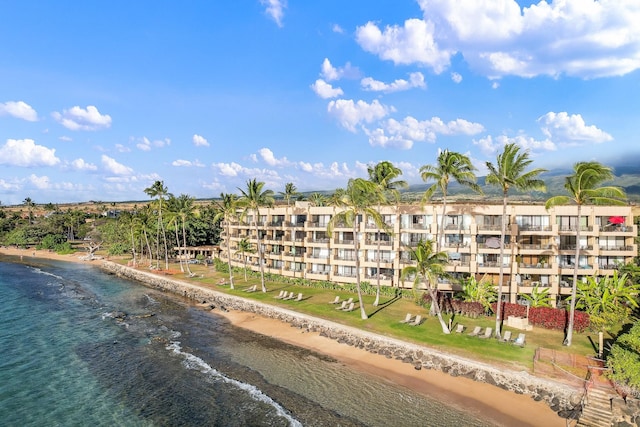 bird's eye view featuring a water view and a beach view