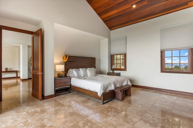 bedroom featuring high vaulted ceiling, light tile floors, and wood ceiling