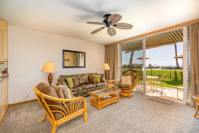 living room featuring carpet and ceiling fan