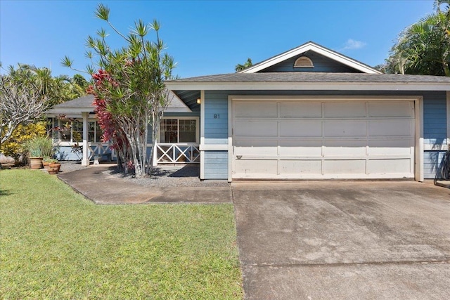 single story home with a garage and a front yard