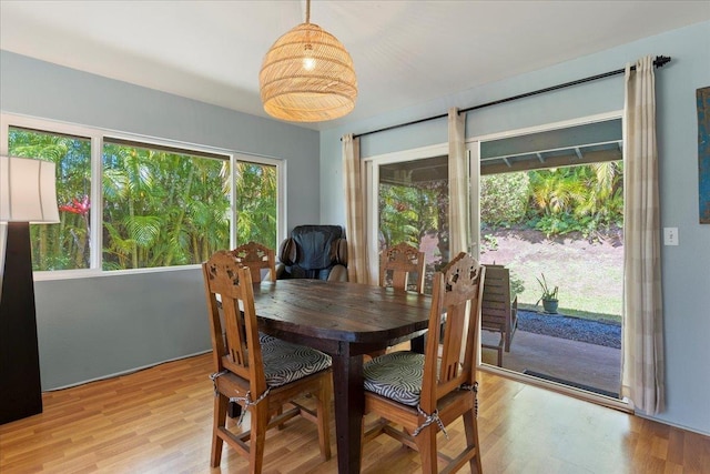 dining area with light wood-type flooring