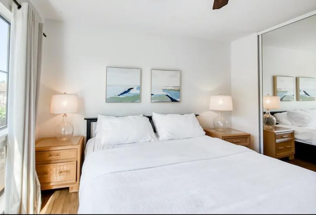3740 Lower Honoapiilani Rd Unit B103, Lahaina, HI 96761 - bedroom with wood finished floors and a ceiling fan