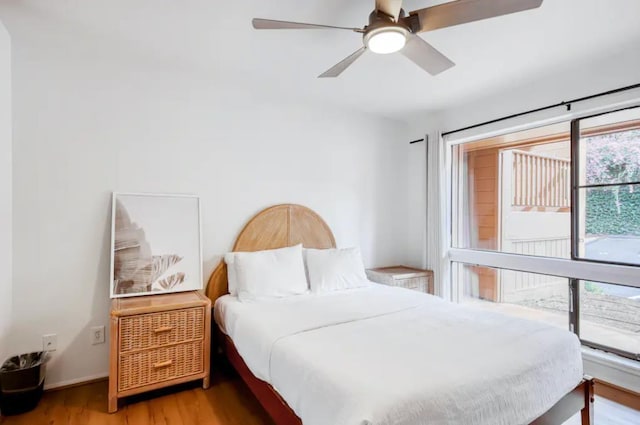 3740 Lower Honoapiilani Rd Unit B103, Lahaina, HI 96761 - bedroom with wood finished floors and a ceiling fan