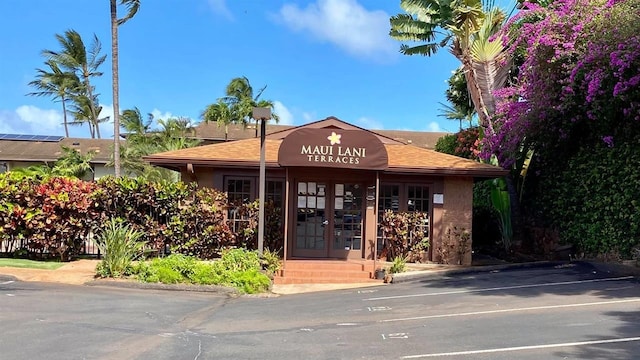 3740 Lower Honoapiilani Rd Unit B103, Lahaina, HI 96761 - view of building exterior featuring uncovered parking