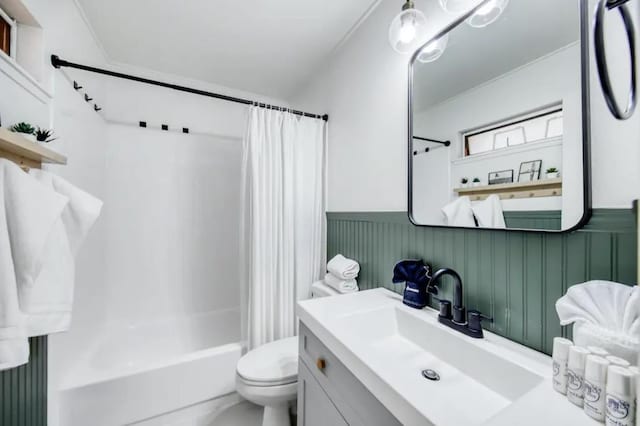 3740 Lower Honoapiilani Rd Unit B103, Lahaina, HI 96761 - bathroom with toilet, shower / tub combo, vanity, and a wainscoted wall