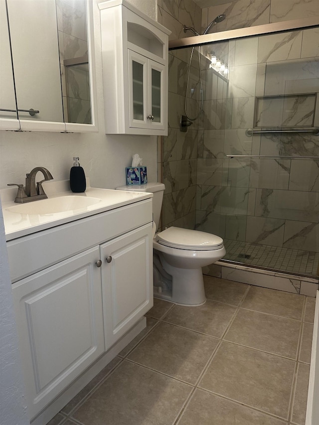 715 S Kihei Rd Unit D143, Kihei, HI 96753 - full bathroom featuring vanity, a stall shower, toilet, and tile patterned floors