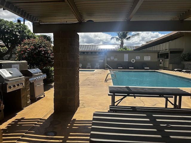 715 S Kihei Rd Unit D143, Kihei, HI 96753 - community pool with a grill, a pergola, and a patio
