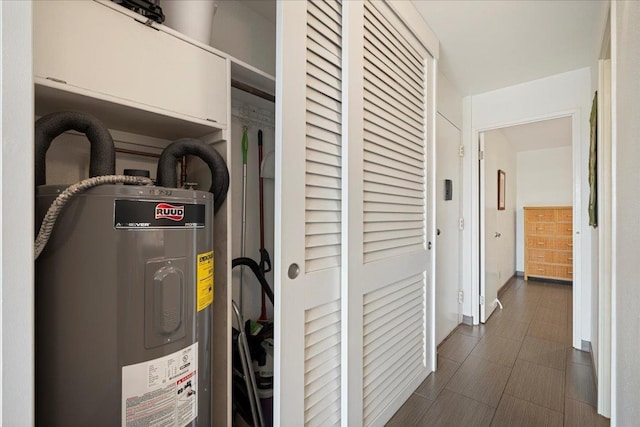 utility room with water heater