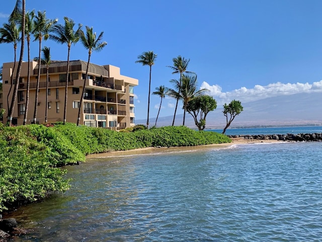 property view of water featuring a beach view