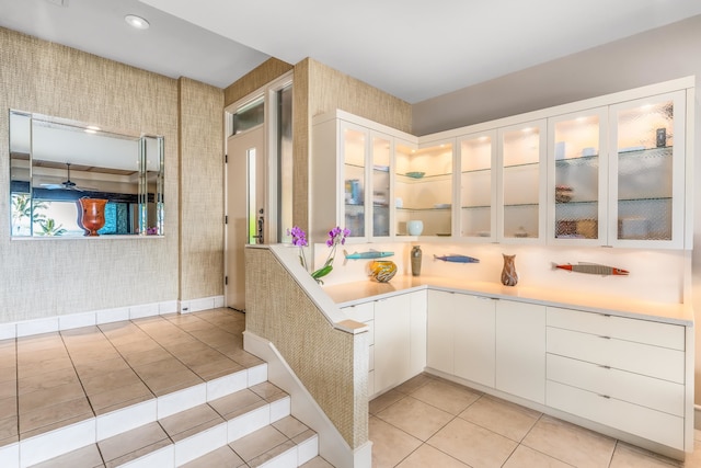 bathroom featuring tile patterned flooring and ceiling fan