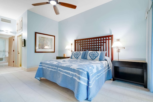 bedroom with ceiling fan and connected bathroom