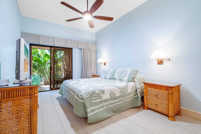 bedroom with ceiling fan and access to outside